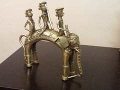 King and two men on elephant