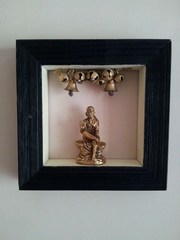 Sai Baba in black frame